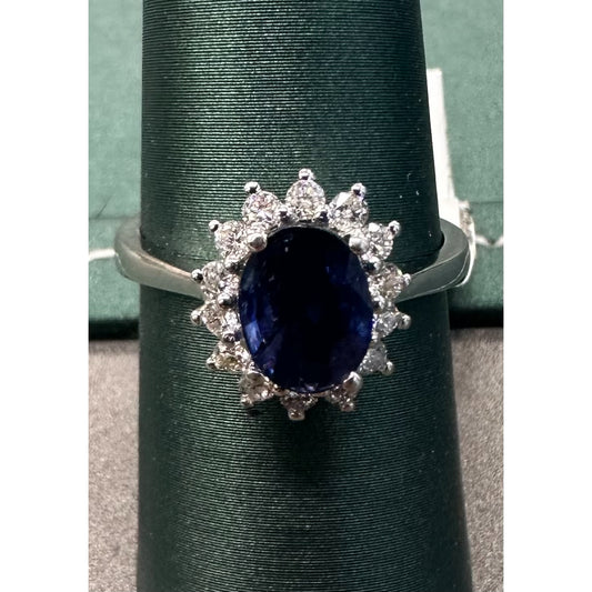 Sapphire diamond halo solitaire ring