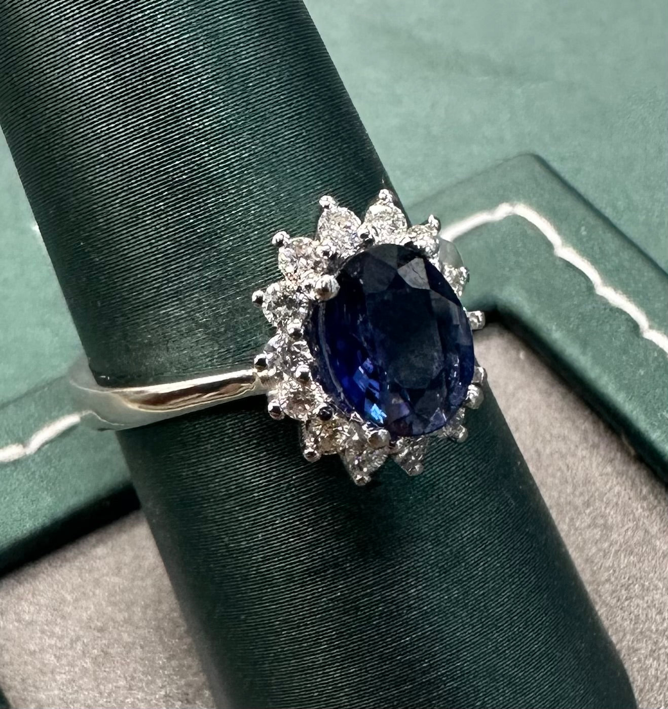Sapphire diamond halo solitaire ring