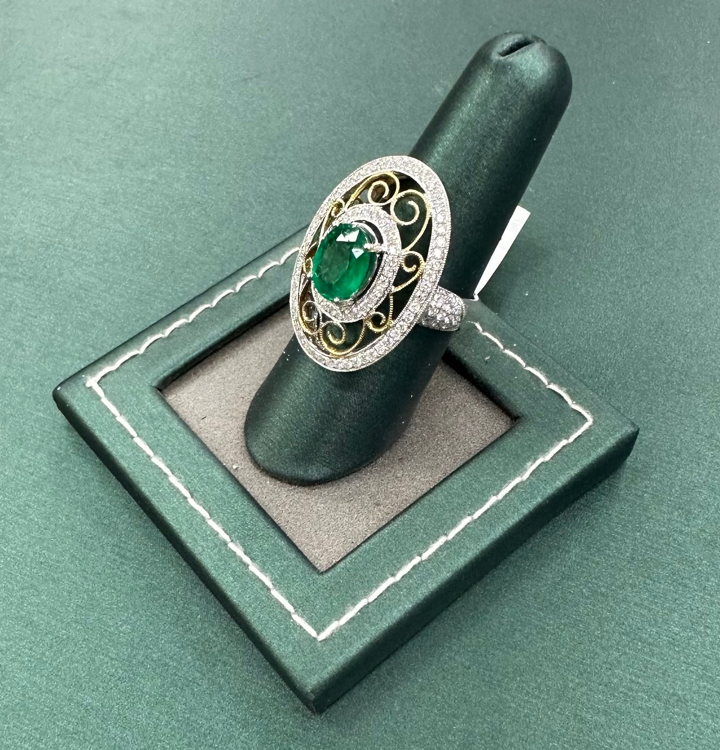 The heaven halo emerald and diamond ring