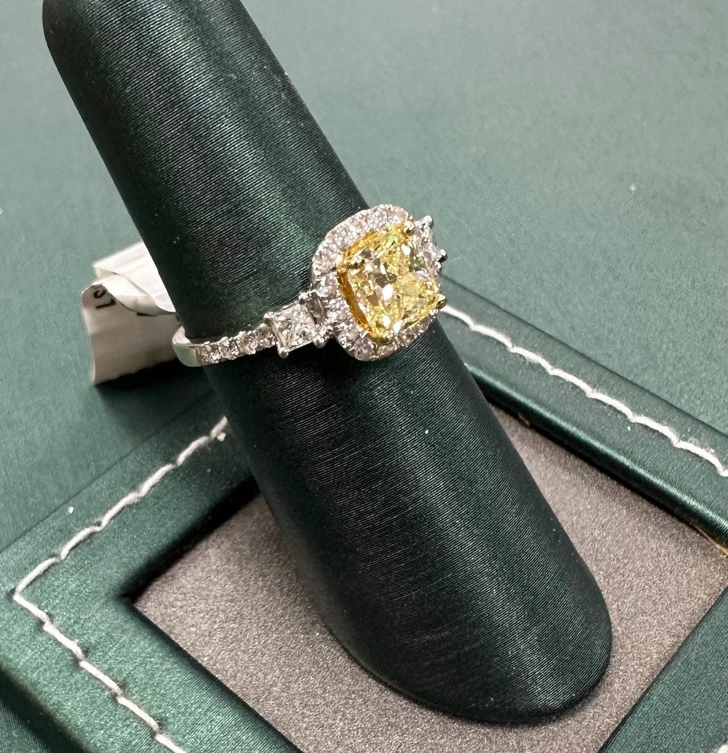 Three stone princess cut yellow diamond ring
