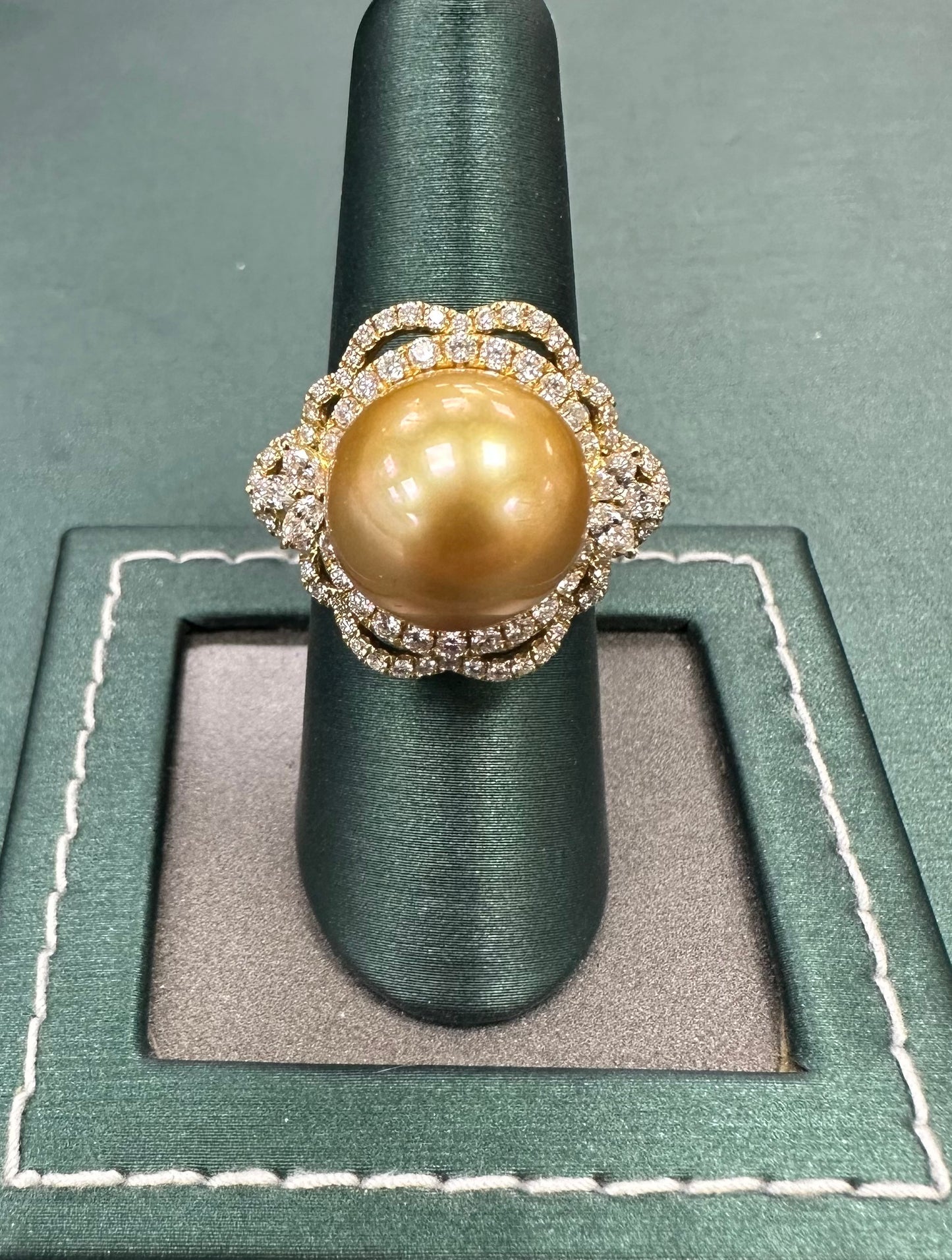 Golden pearl diamond ring