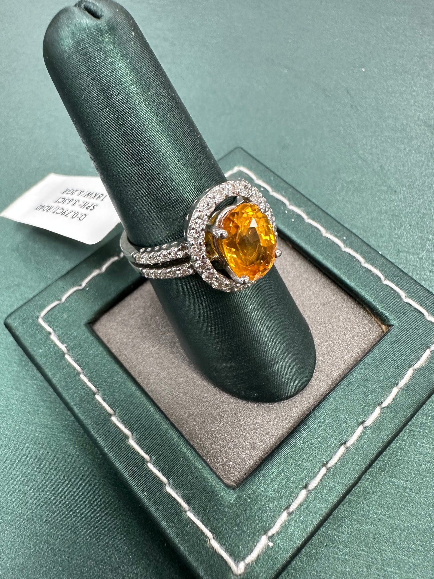 Orange sapphire diamond ring