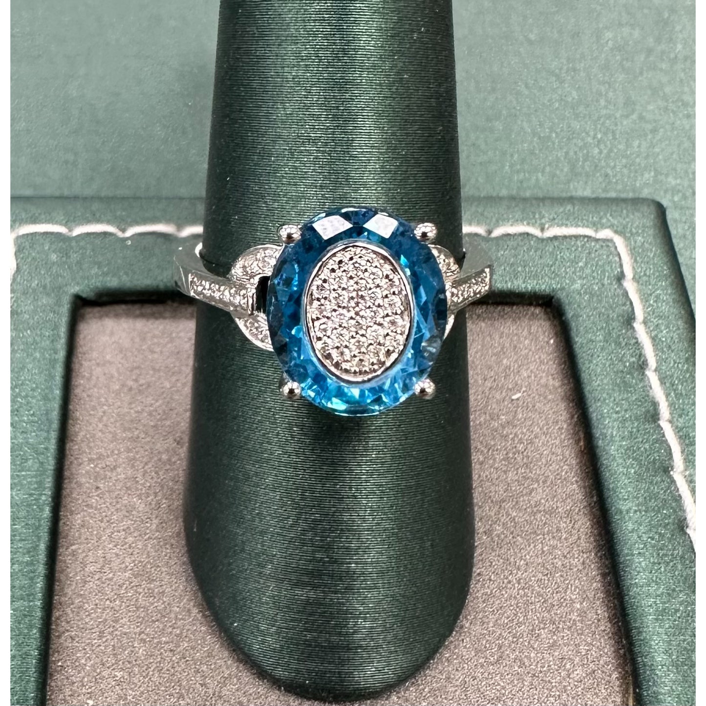 Diamond and topaz shield ring