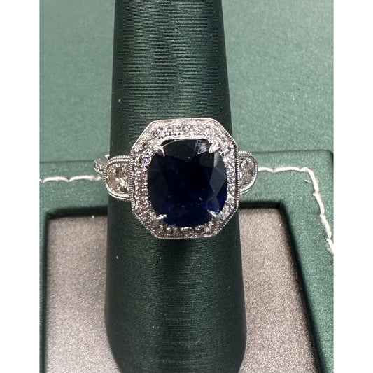 Queens three stone sapphire and diamond ring