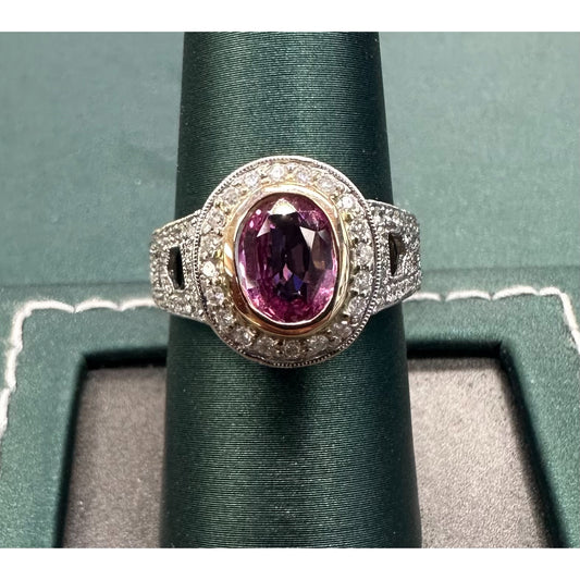 Oval pink sapphire halo ring