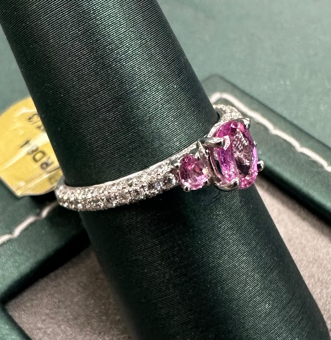 Three stone oval pink sapphire ring