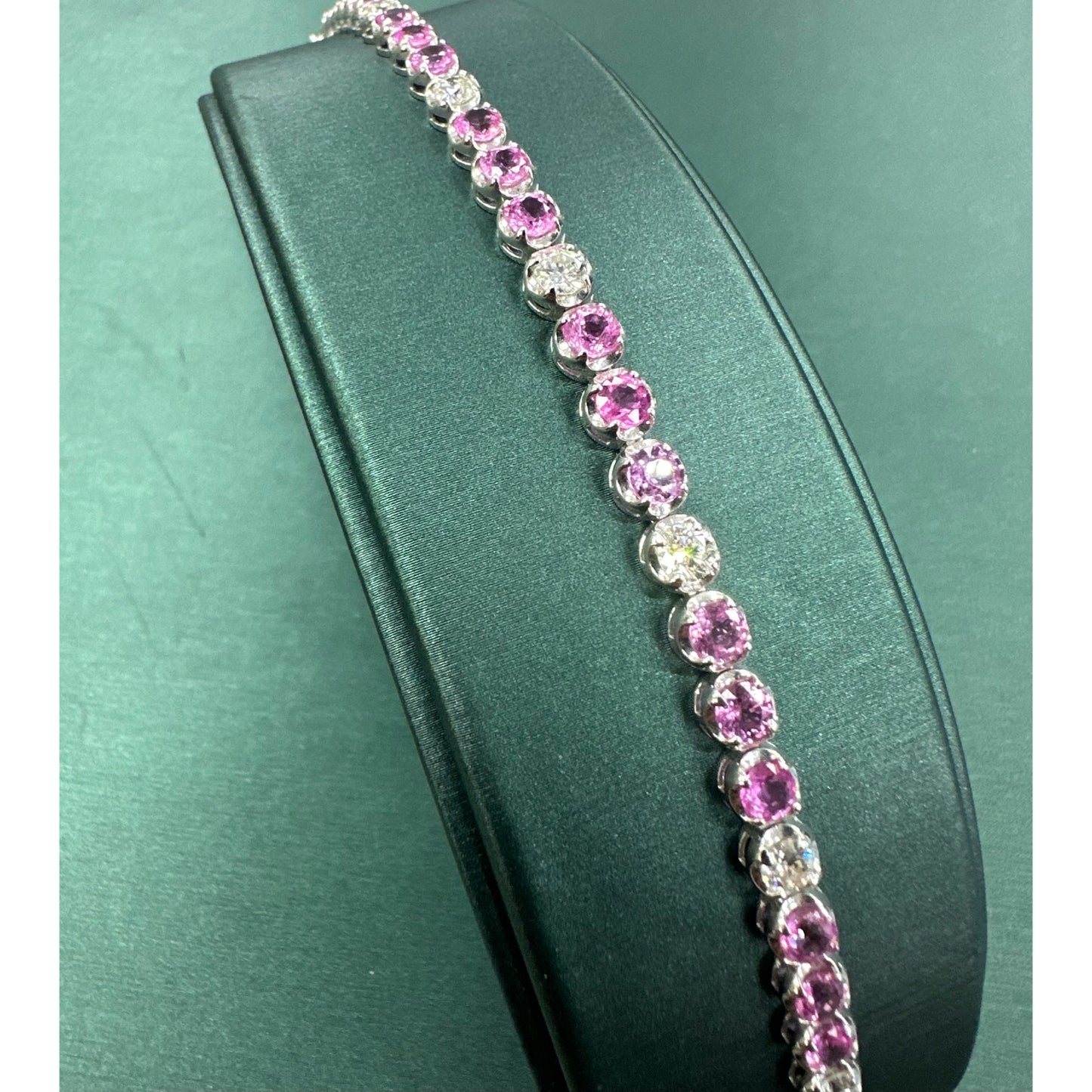 Pink sapphire and diamond tennis bracelet