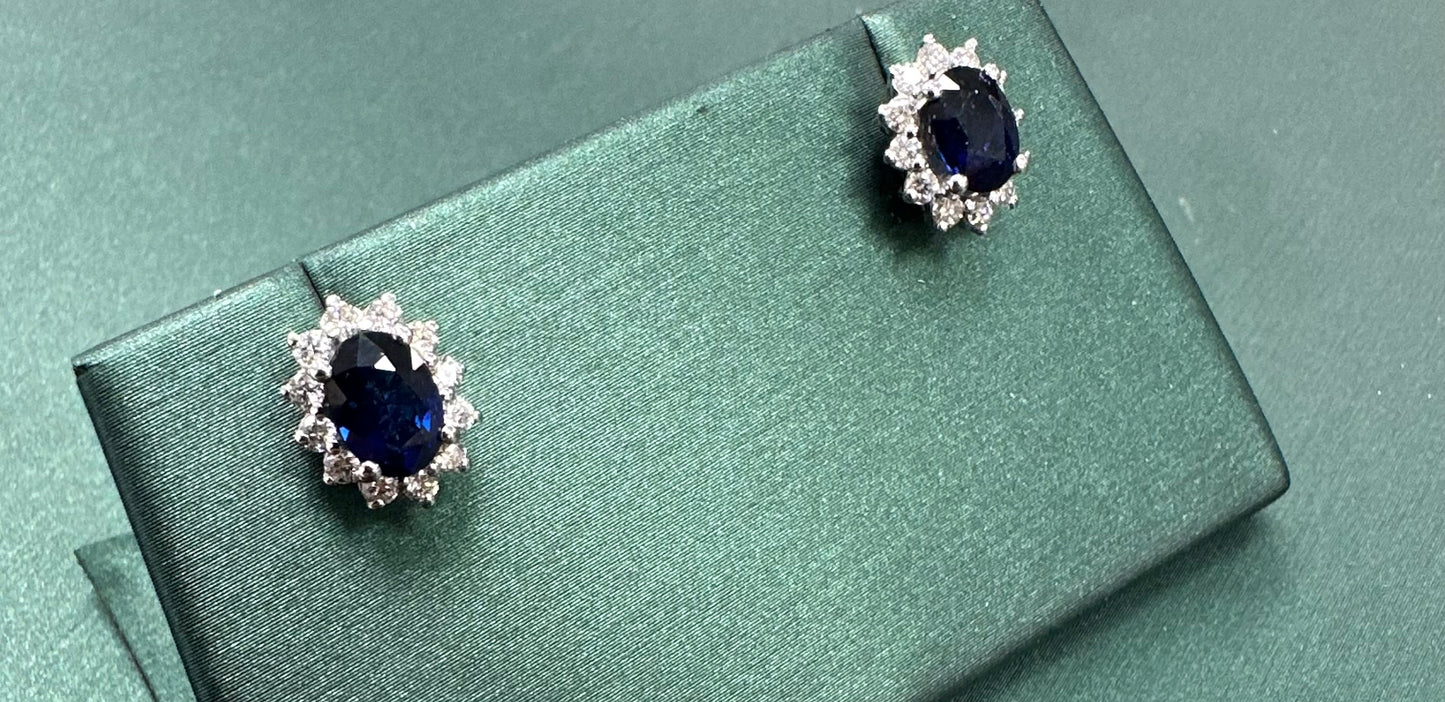 Oval sapphire diamond halo earrings