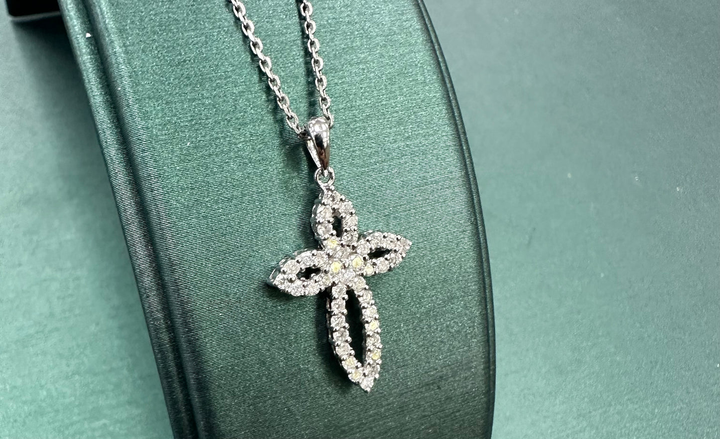 Mini diamond rounded cross pendant