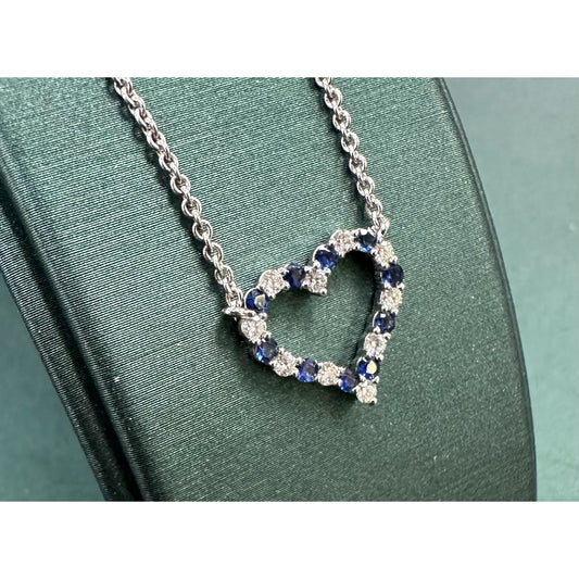 Polka dot diamond and blue sapphire heart necklace