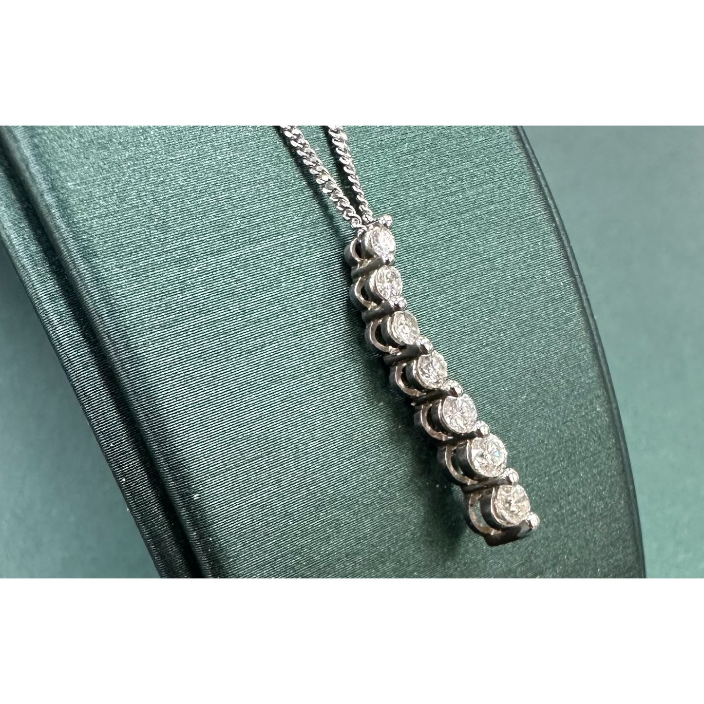 7 Diamond Swirl Droplet Necklace