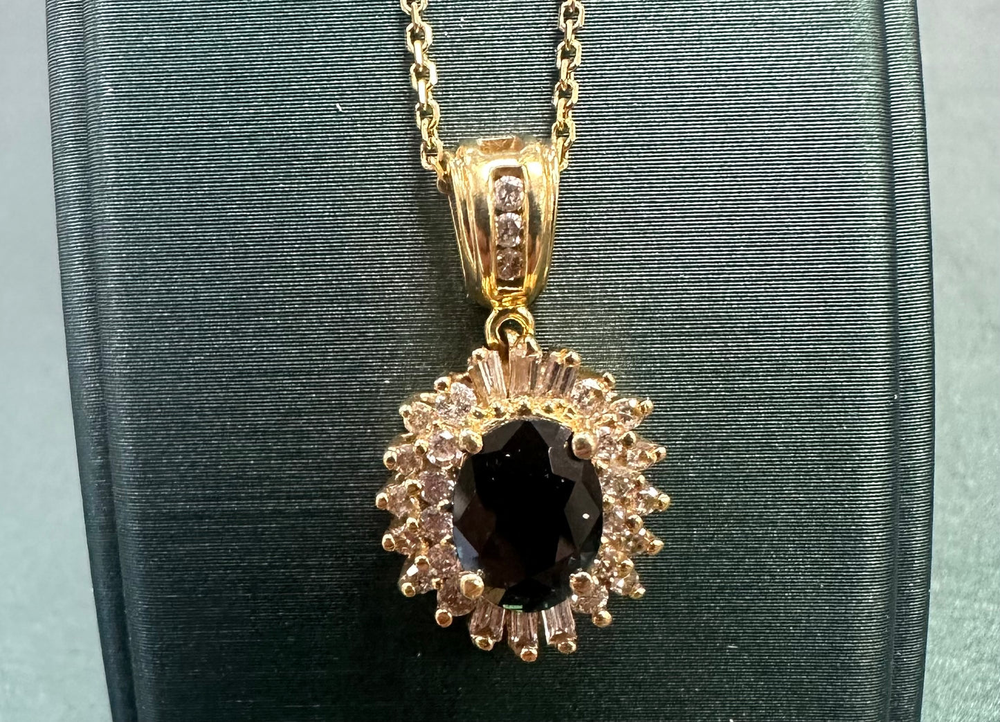 Oval sapphire sun Diamond halo necklace