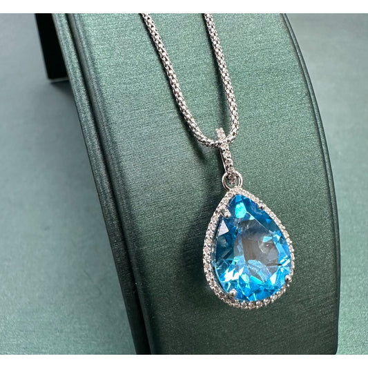 Pear shape Swiss blue topaz diamond halo necklace