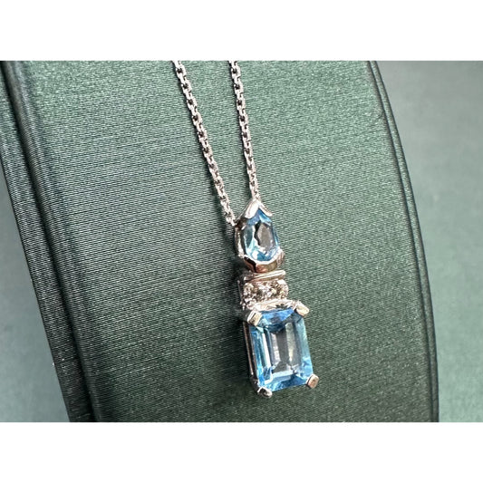 Swiss blue topaz emerald cut dangle diamond necklace