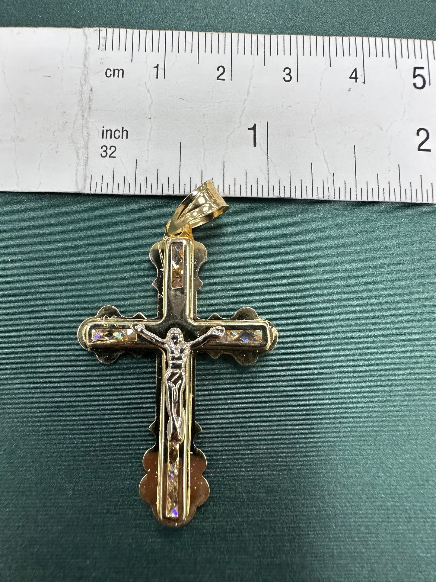 Wavy Gold cross with elongated crystals pendant